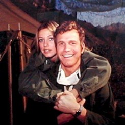 Color CBS promotional image for MASH featuring Karen Philipp and Wayne Rogers