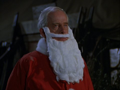 Image of Colonel Potter dressed up as Santa Claus
