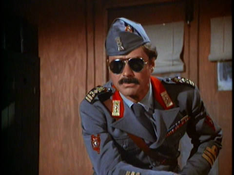 Colonel Flagg wearing an outrageous military uniform