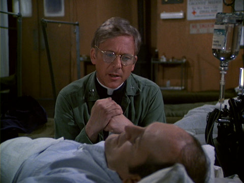 Still from the M*A*S*H episode Heroes showing Father Mulcahy