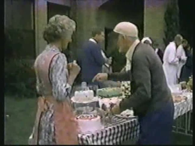 Still from the AfterMASH episode Sunday, Cruddy Sunday showing Mildred and Bob Scannell.