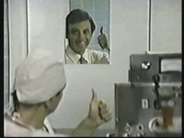 Still from the AfterMASH episode Fever Pitch showing Klinger and Dr. Boyer.