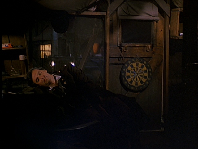 Still from the MASH episode The Winchester Tapes showing Hawkeye.