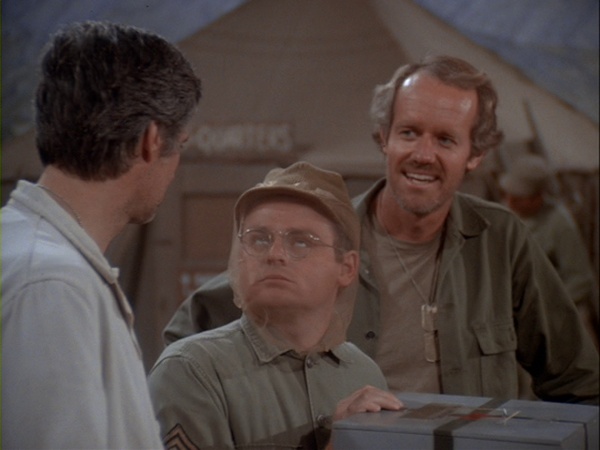 Still from the MASH episode B.J. Papa San showing Hawkeye, Radar, and B.J.