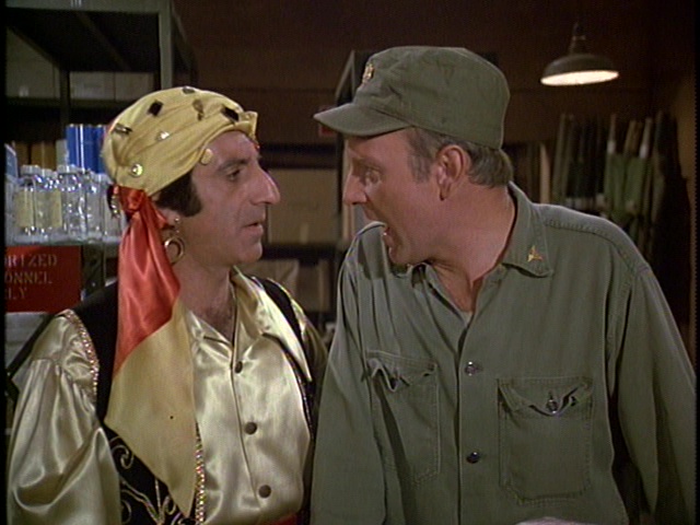 Still from the MASH episode Hawkeye Get Your Gun showing Klinger and Frank.