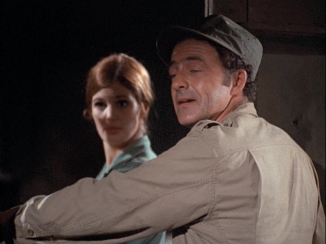 Still from the MASH episode Yankee Doodle Doctor showing two extras.