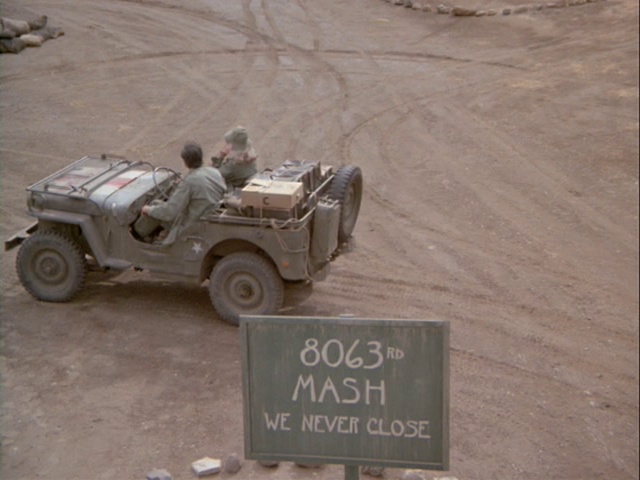 Still from the MASH episode Comrades in Arms, Part 1 showing Hawkeye and Margaret at the 8063rd.