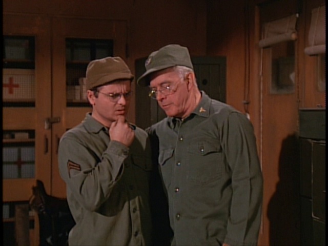 Still from the MASH episode Soldier of the Month showing Radar and Colonel Potter.