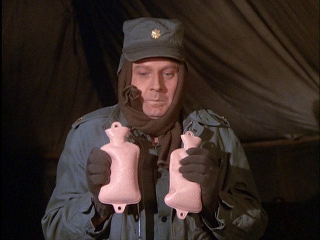 Still from the MASH episode For Want of a Boot showing Frank.