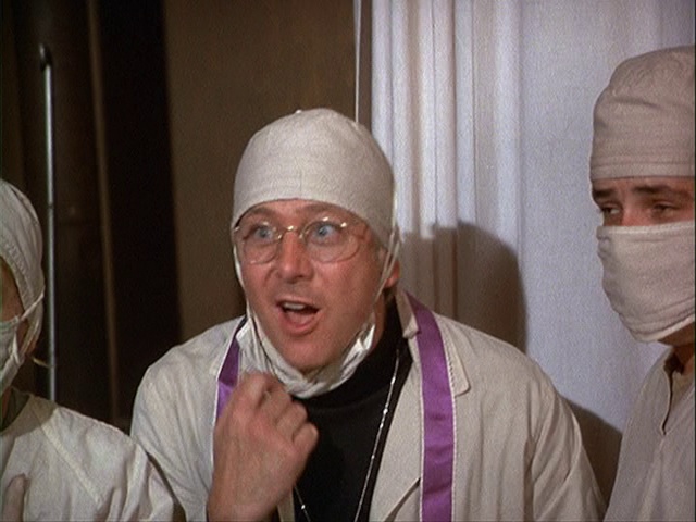 Still from the MASH episode Radar's Report showing Father Mulcahy.
