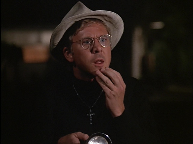 Still from the MASH episode White Gold showing Father Mulcahy.