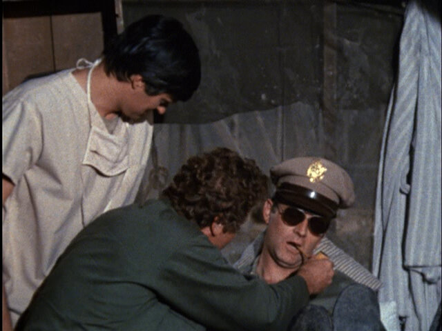 Still from the episode The Sniper showing Hawkeye, Trapper, and Frank.
