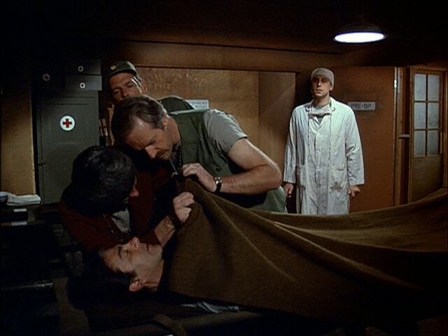 Still from the MASH episode Rumor at the Top showing Hawkeye and BJ.