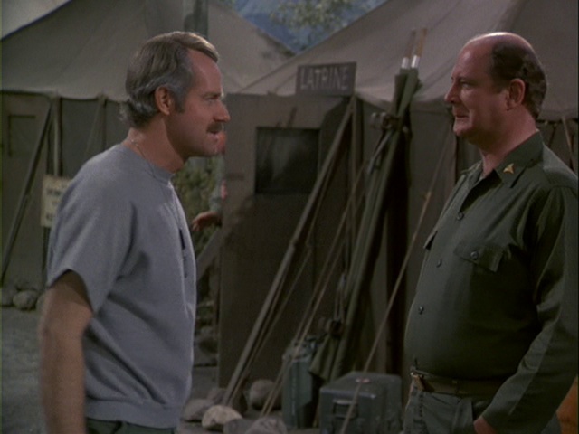 Still from the MASH episode Sons and Bowlers showing BJ and Charles.