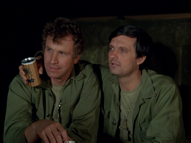 Still from the M*A*S*H episode Ceasefire showing Trapper and Hawkeye.