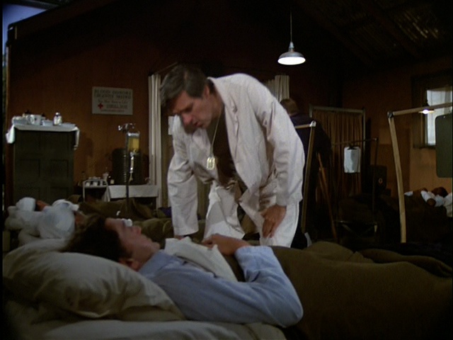 Still from the MASH episode The Grim Reaper showing the studio wall.